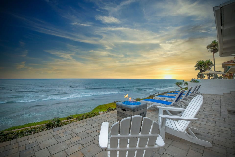 Enjoy your favorite drink at sunset by the firepit