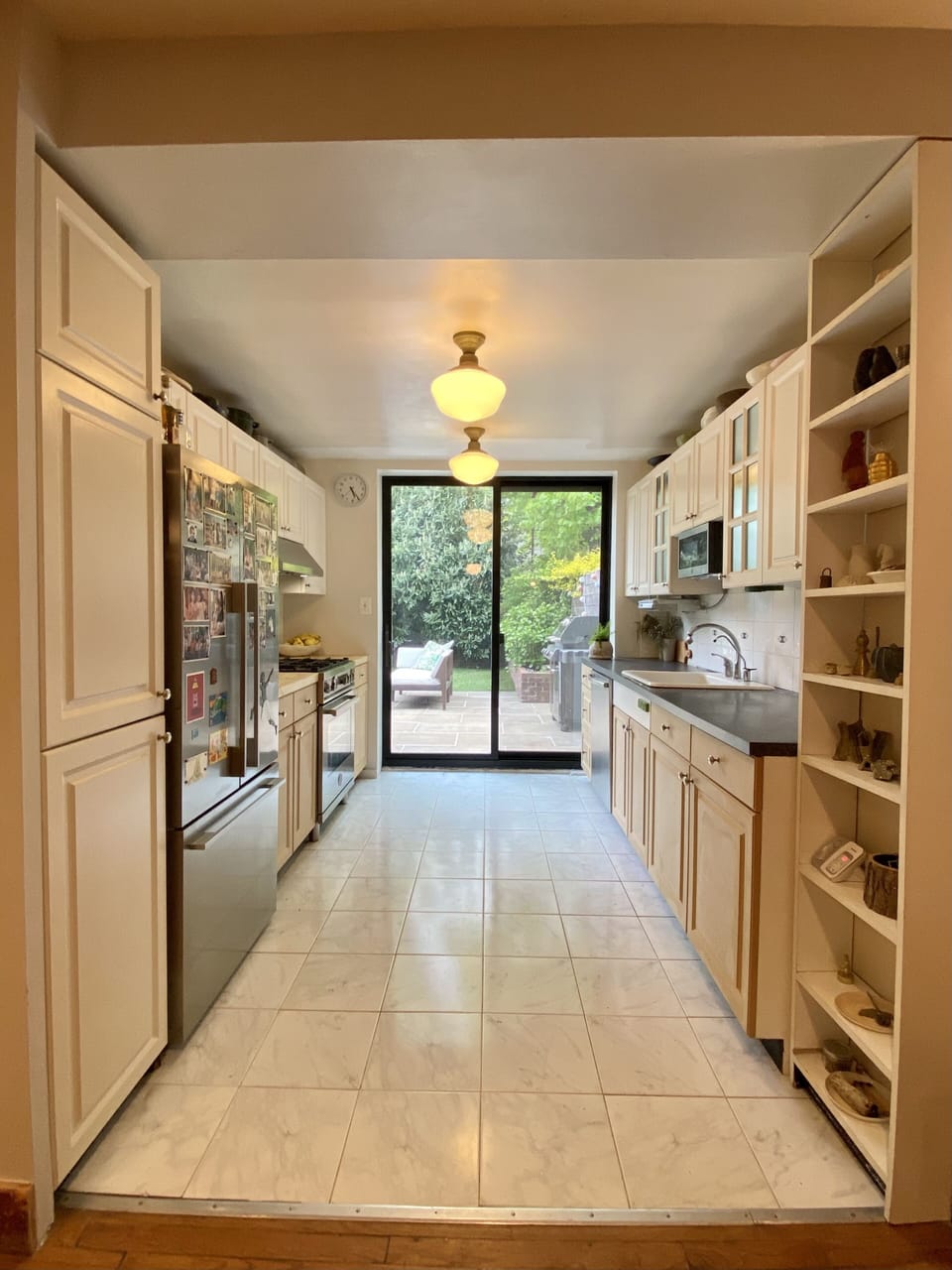 Ground floor kitchen with sliding door leading to garden