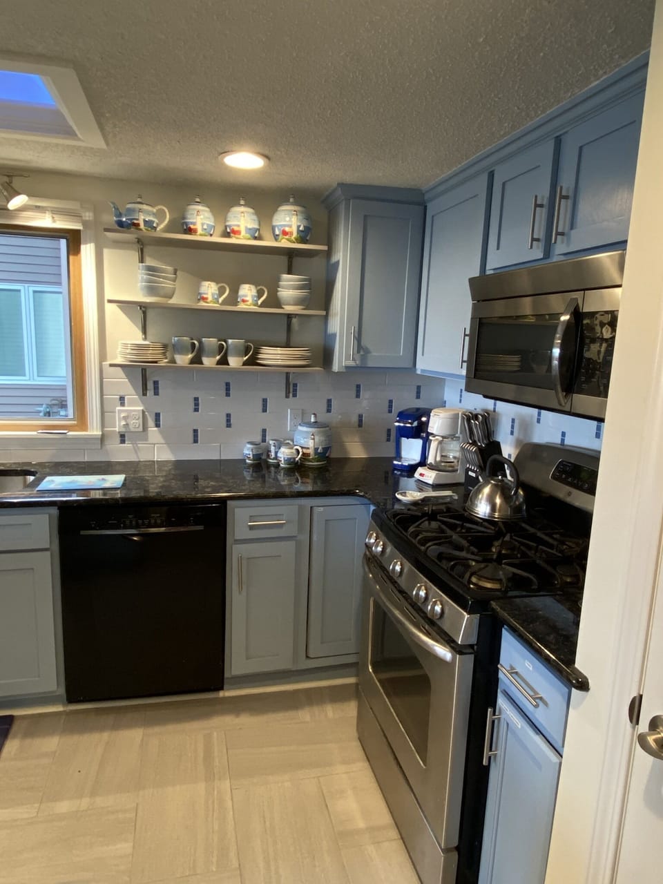 There are place settings for 12 in our fully stocked kitchen.