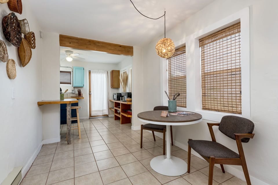Dining area leading into the kitchen.
