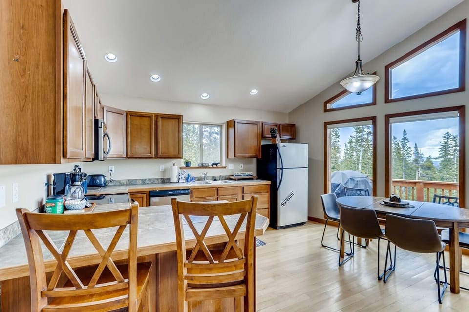 The chef of the group will love this kitchen. They can prepare the meals while still being a part of the conversation with the open kitchen plan.