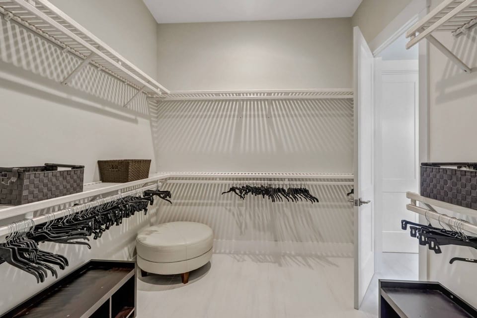 The 1st guest suite enjoys a spacious walk-in closet, no need to pack lightly here!