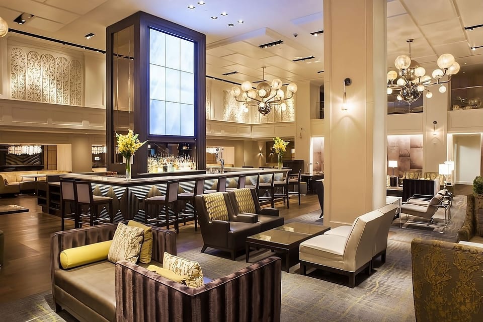 Settle into spacious, designer seating with a lively bar nearby.