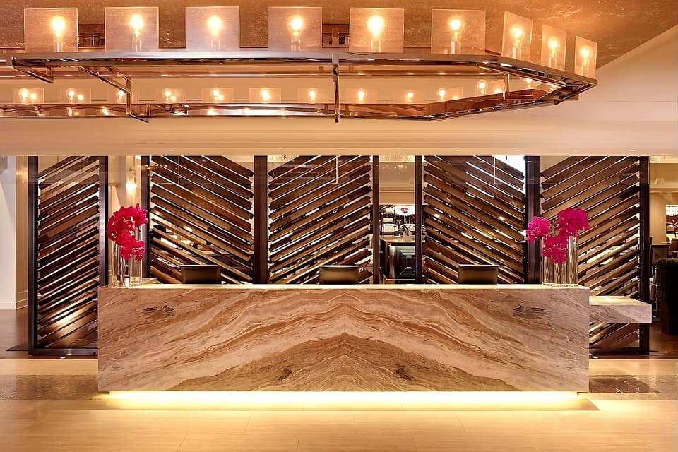 Check in effortlessly at a marble-accented, welcoming reception.