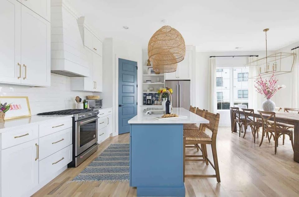 Modern Kitchen with Stainless Steel Appliances and Seating Counter