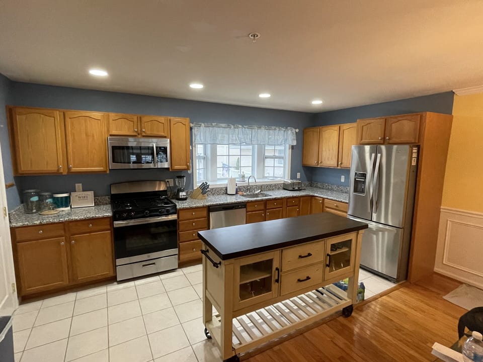 New SS appliances and island in the kitchen