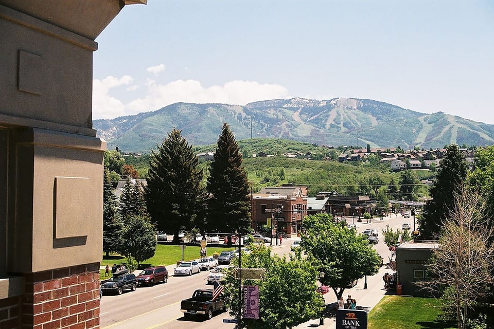 Mountain town view with ski slopes and downtown area visible from the property location.