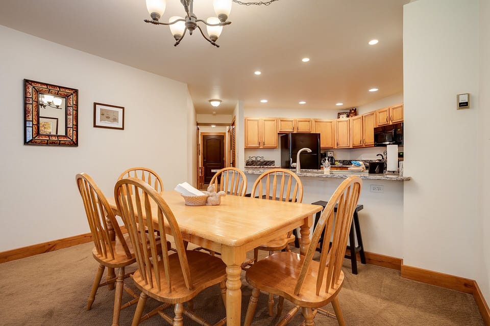 Gather around your spacious dining table for memorable meals together, with a fully-equipped kitchen ready for all your culinary adventures.
