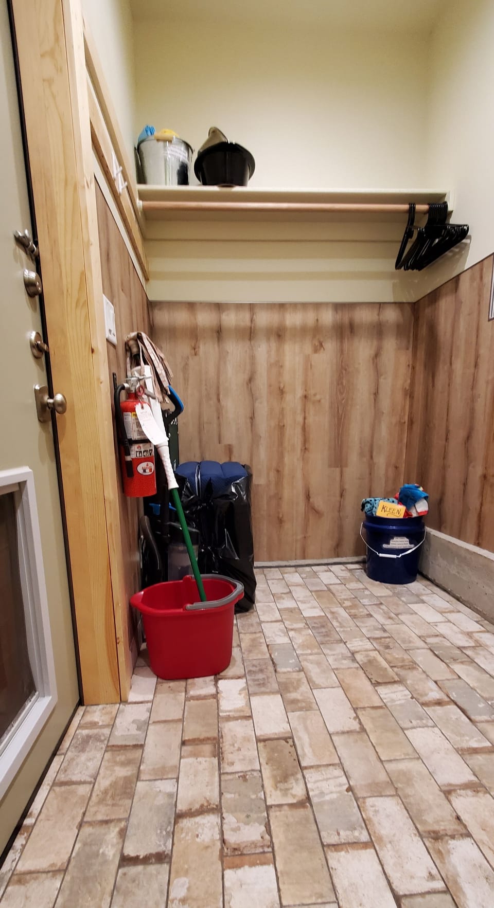Mud Room with stored Coleman cot+4" mattress & LakeTowels (summer) & DogDishes