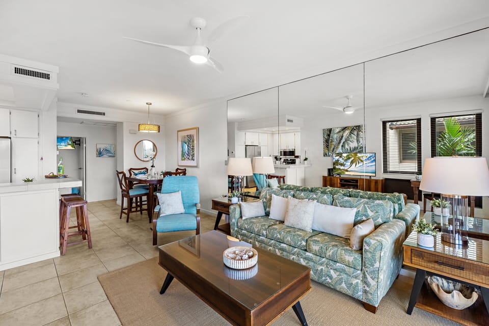 Bright, open-concept living room with lanai access.