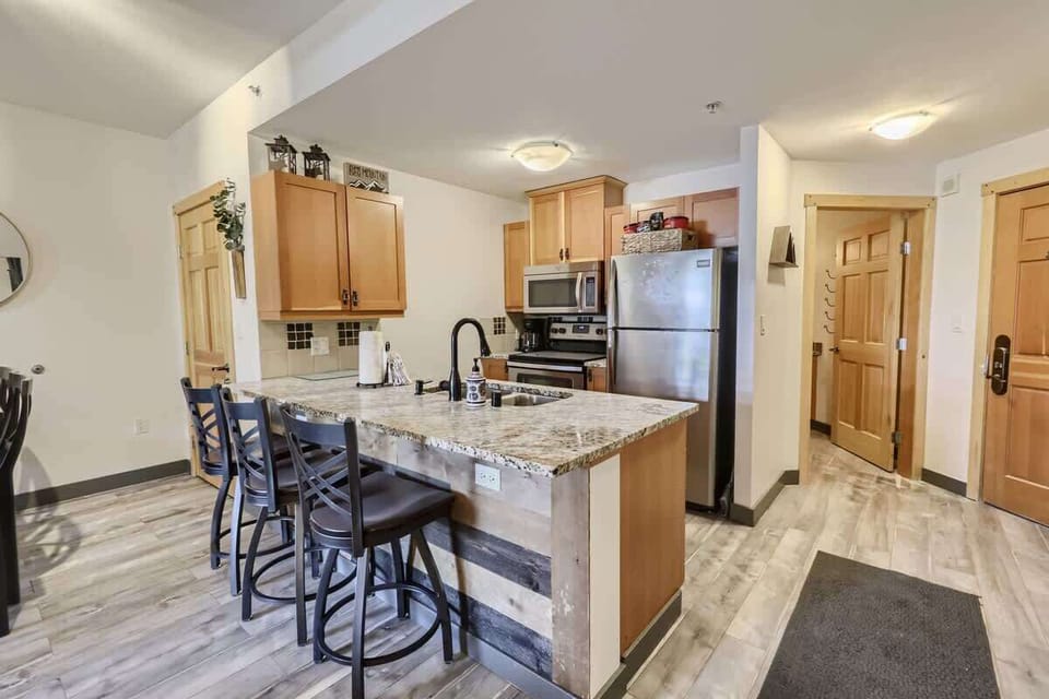 Kitchen is fully stocked for preparing meals. 