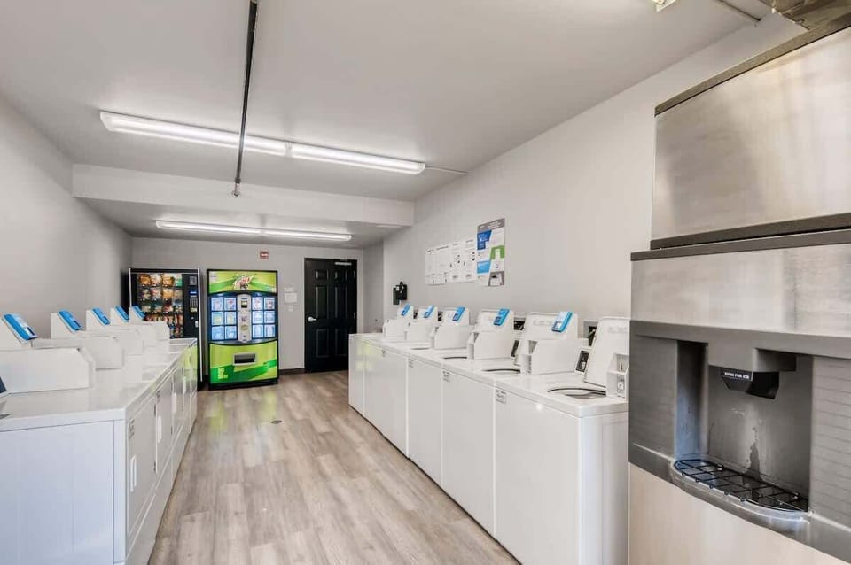 Laundry Room with Snack Machine and Ice Machine