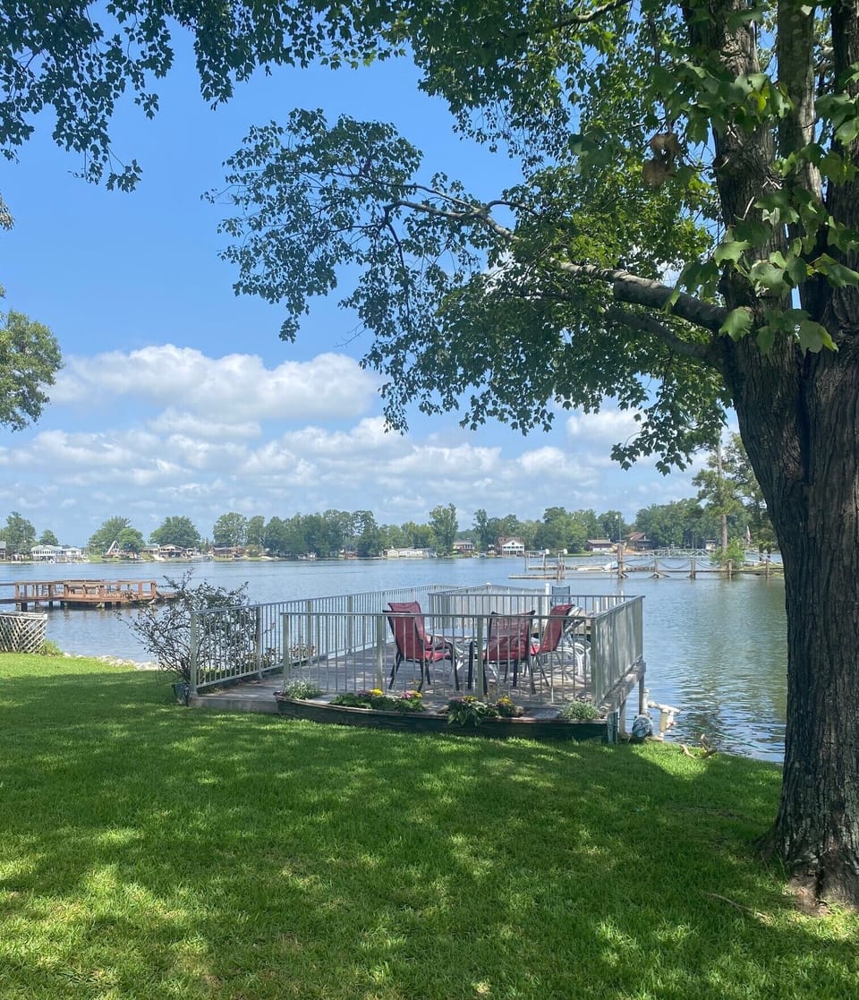View of the lake and dining area on the dock.
