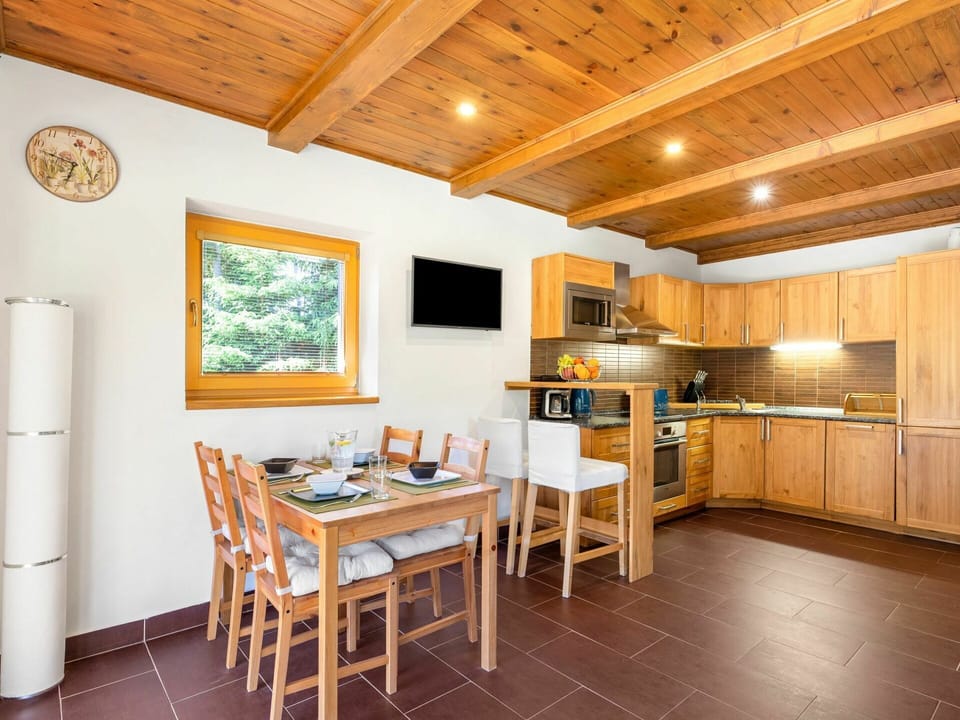 Table, Furniture, Cabinetry, Wood, Picture Frame, House, Chair, Building, Lighting, Kitchen & Dining Room Table