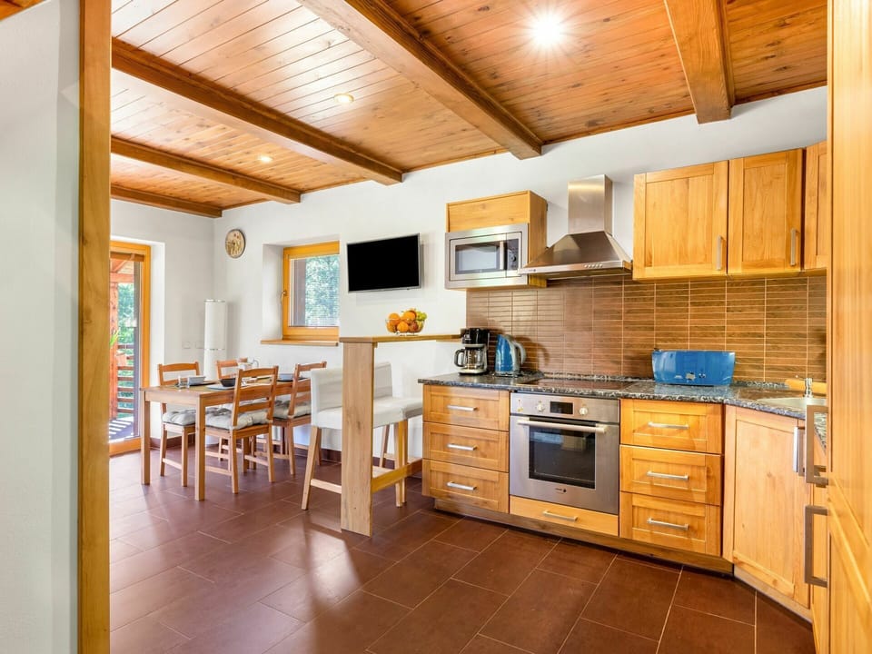 Cabinetry, Countertop, Property, Furniture, Kitchen Appliance, Kitchen Stove, Wood, Building, Drawer, Interior Design