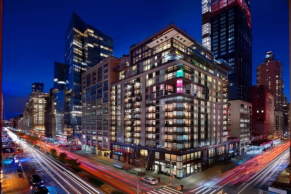 Arrive to a sleek, illuminated building in the heart of downtown.