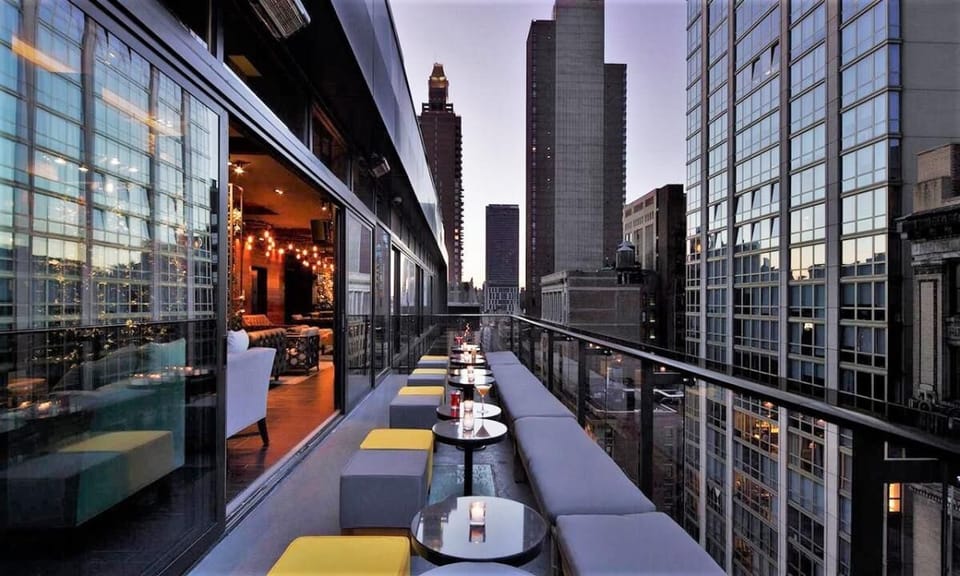 Sip sunset cocktails on a dramatic skyline-view terrace.