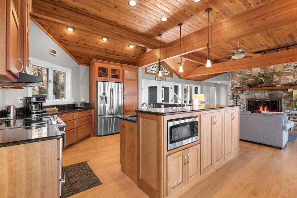 You will appreciate the big open kitchen with its spacious granite counter tops.