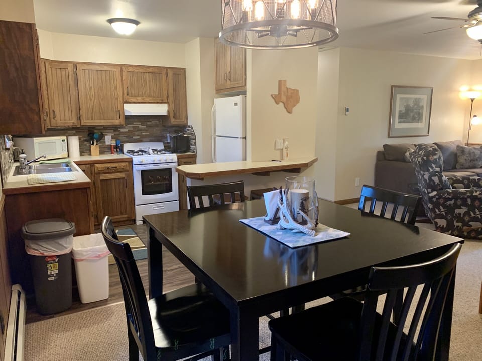 Upstairs is the kitchen complete with gas range and fully stocked.