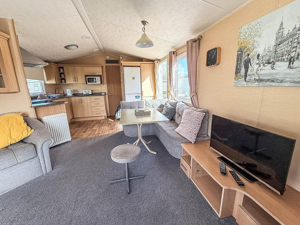 Experience the best of Skegness in England with a staycation at Southview Holiday Park, where the living room in a caravan offers a cosy retreat after exploring Skegness Pier and the family-friendly Skegness Aquarium.