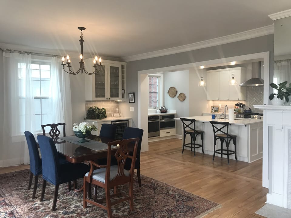 Dining\work area with kitchen in background