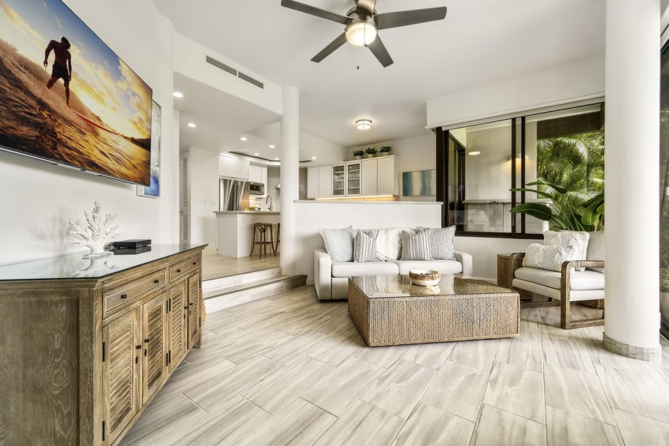 Smart TV, TV Stand, Sofa, Armchair, and Ceiling Fan