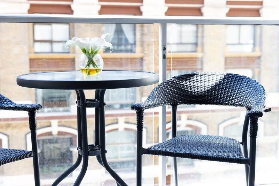 A balcony with a setting.