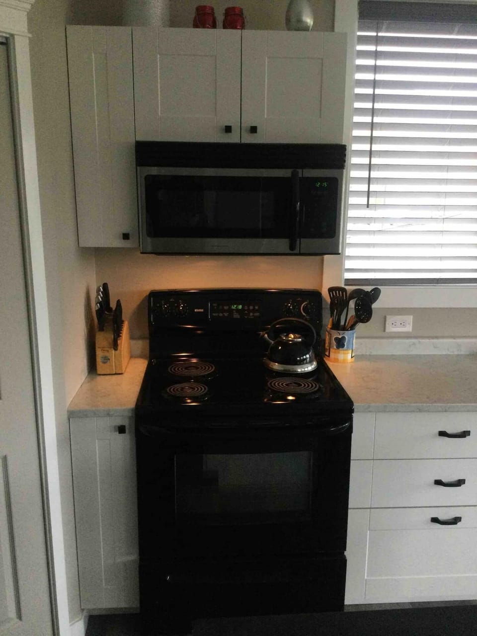 Full sized stove and oven with microwave