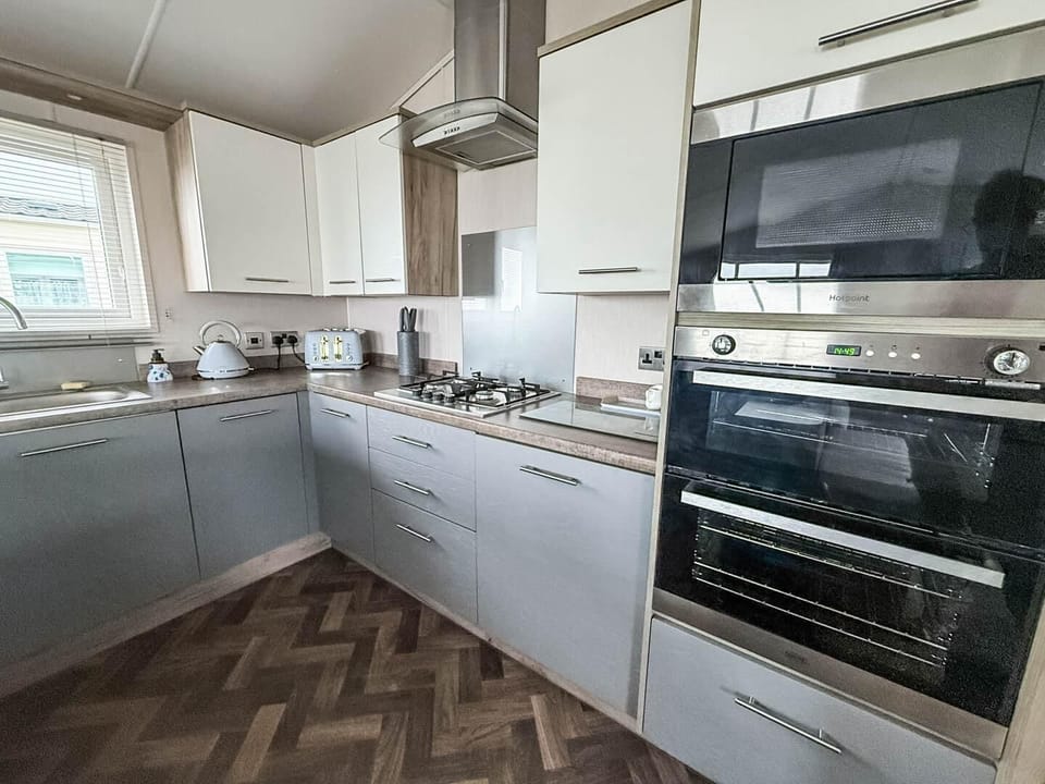 Modern kitchen with sleek appliances and ample counter space
