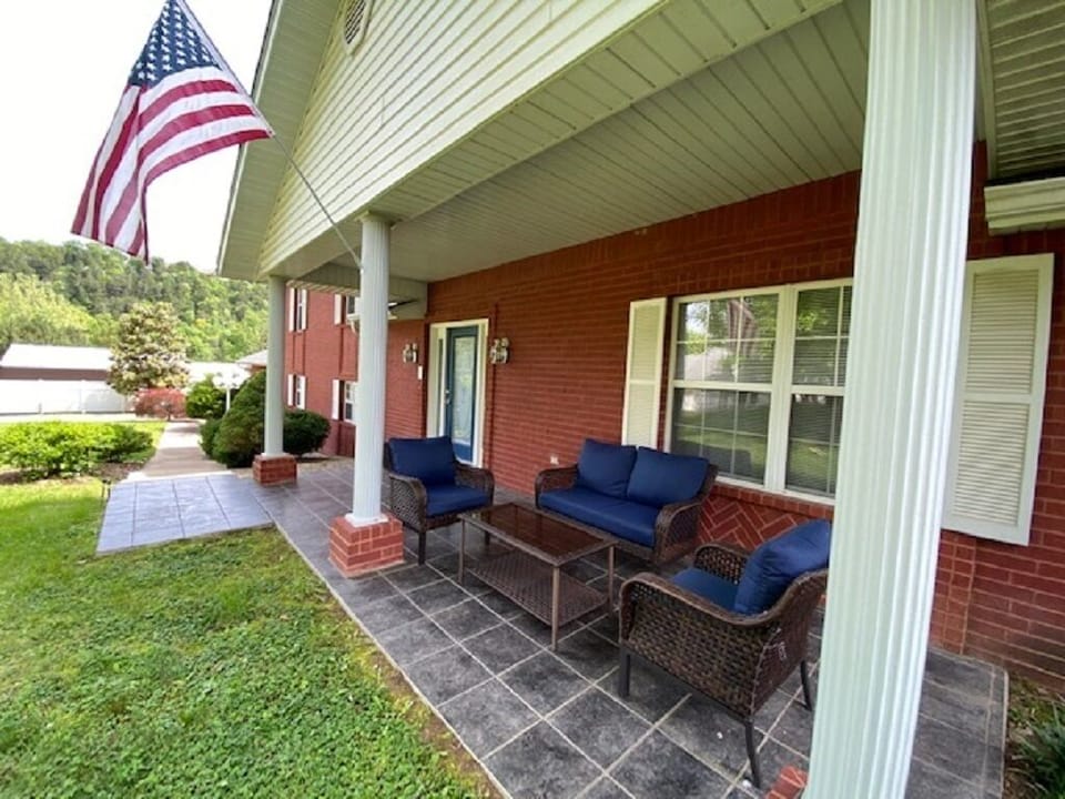 Covered front porch to enjoy throughout the day.  