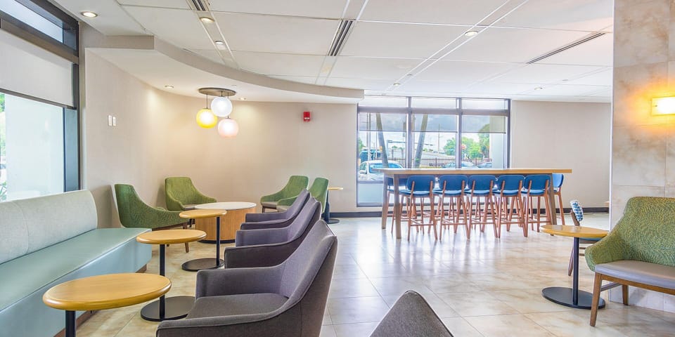 Relax with coffee in airy seating made for conversation.