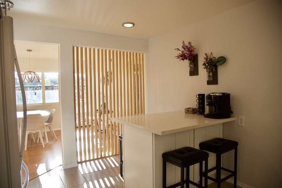 Kitchen area leading into dining room