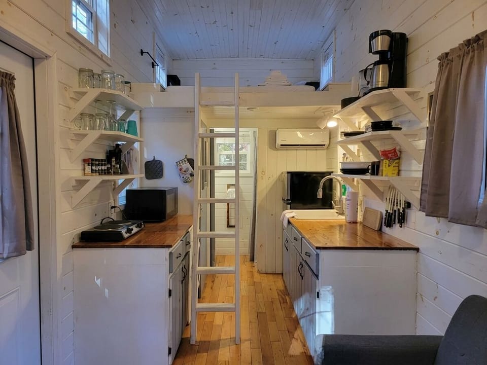 'We are used to small spaces so the tiny home was easy."-Emily Sept2025
