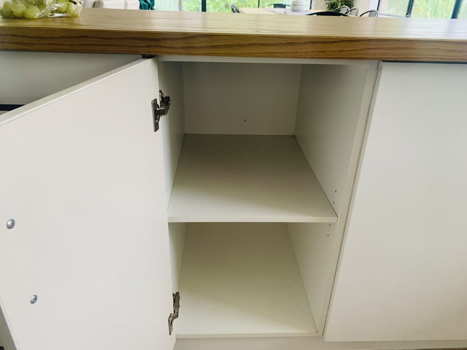 Kitchen cupboard storage for guests 