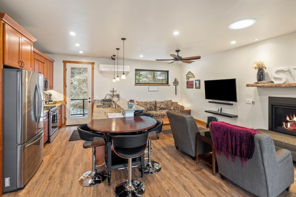 Kitchen, Living Room, Surround Sound, Gas Fireplace, all new furniture.