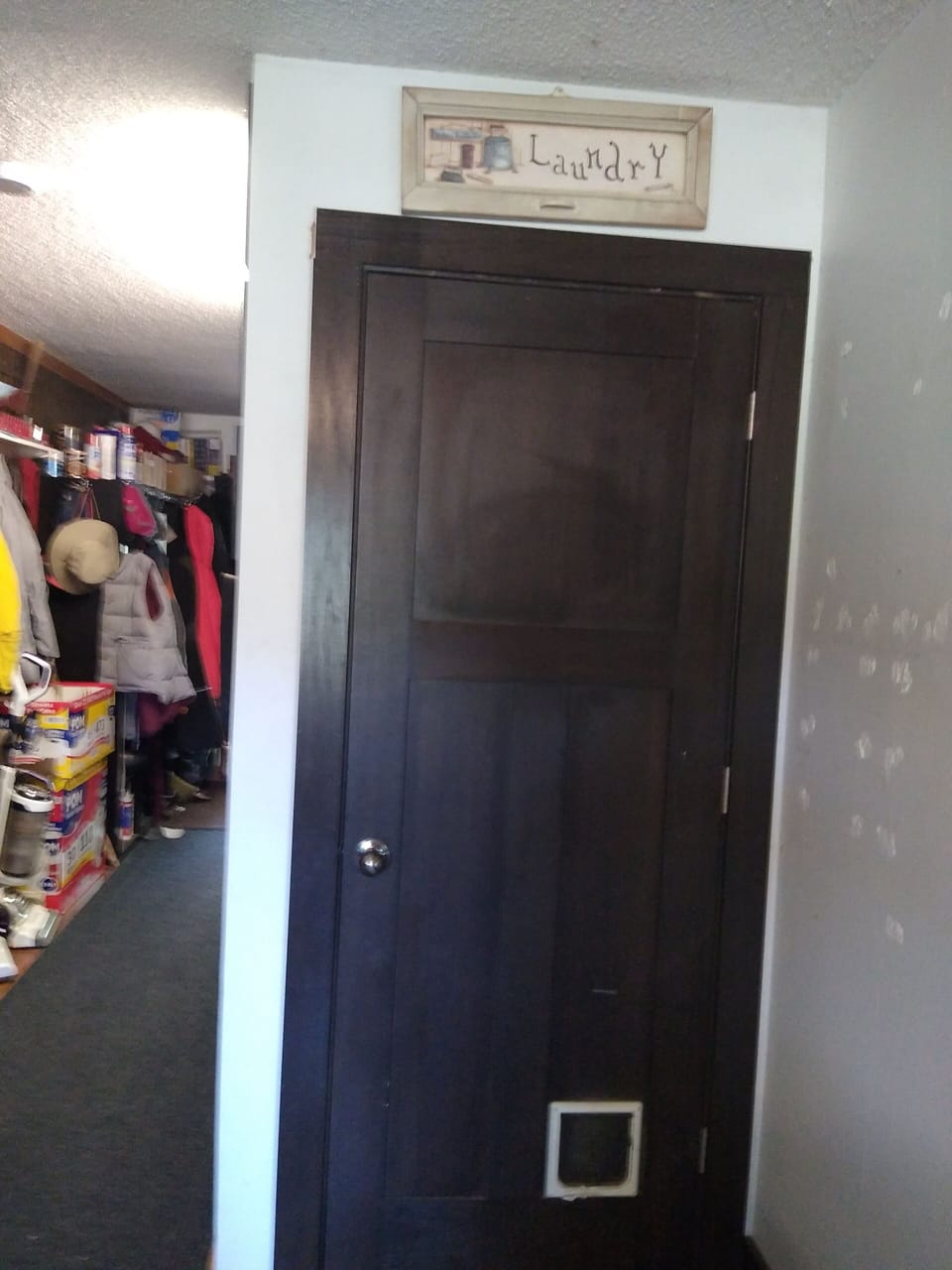 Door off main level kitchen going to basement apartment