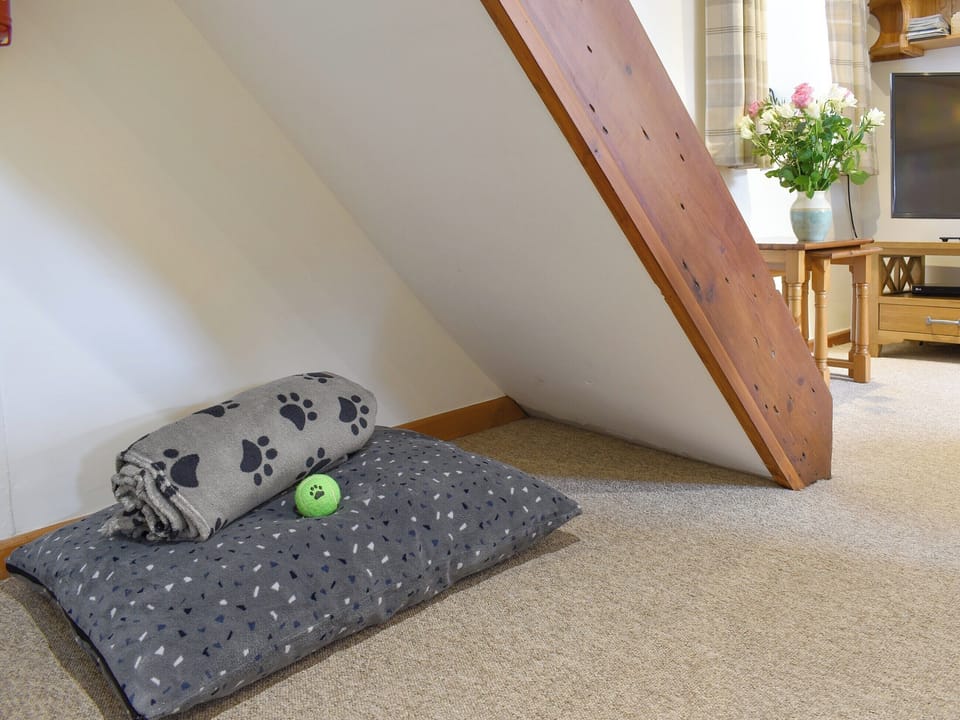 Pet area within the living room | The Old Candle House, Longnor, near Buxton