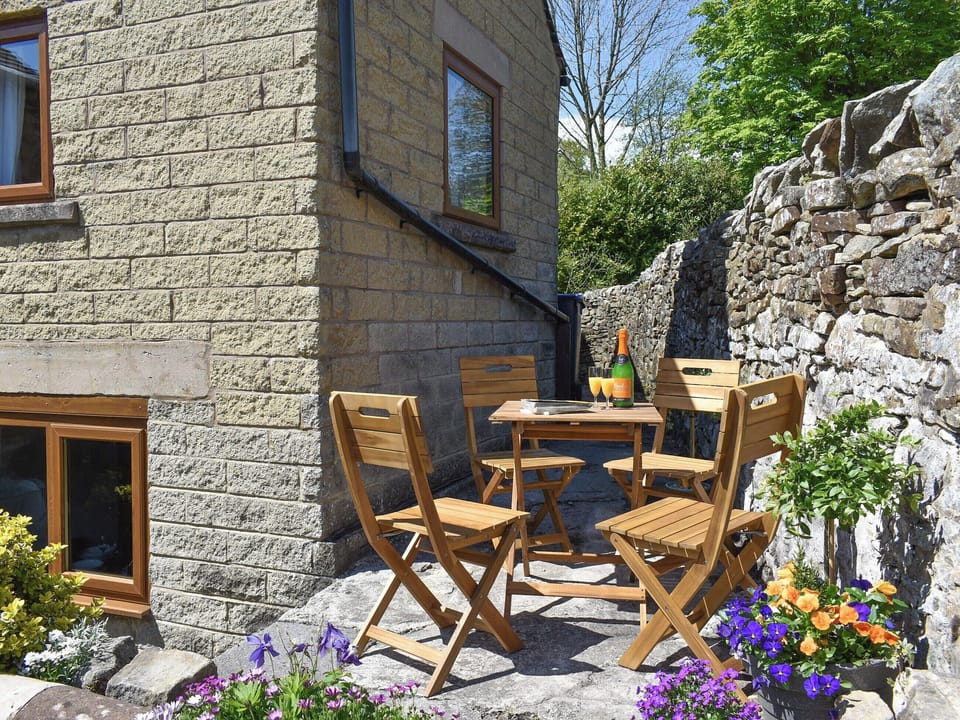 Seating area witin the garden | The Old Candle House, Longnor, near Buxton
