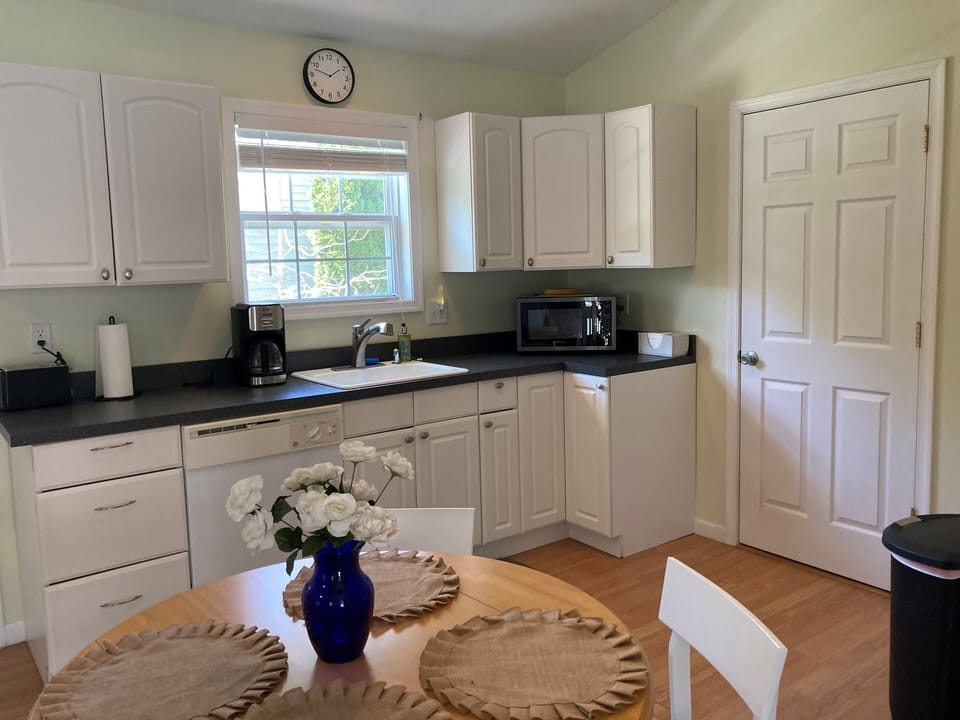 The in-law suite has it's own full kitchen, and private outdoor entry