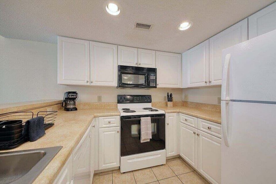 Full Size Stove, Fridge, Dishwasher and Microwave