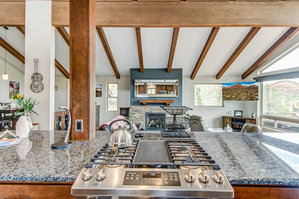 Stainless Steel Appliances Including a 4-Burner and Griddle Gas Range