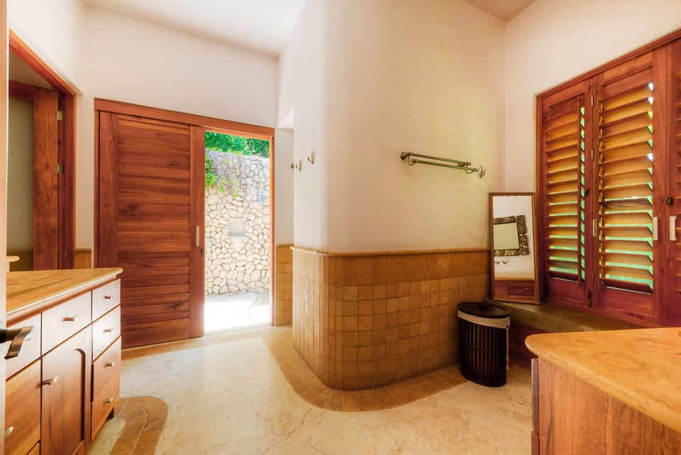 Downstairs EnSuite Master Bath with an outdoor and indoor shower