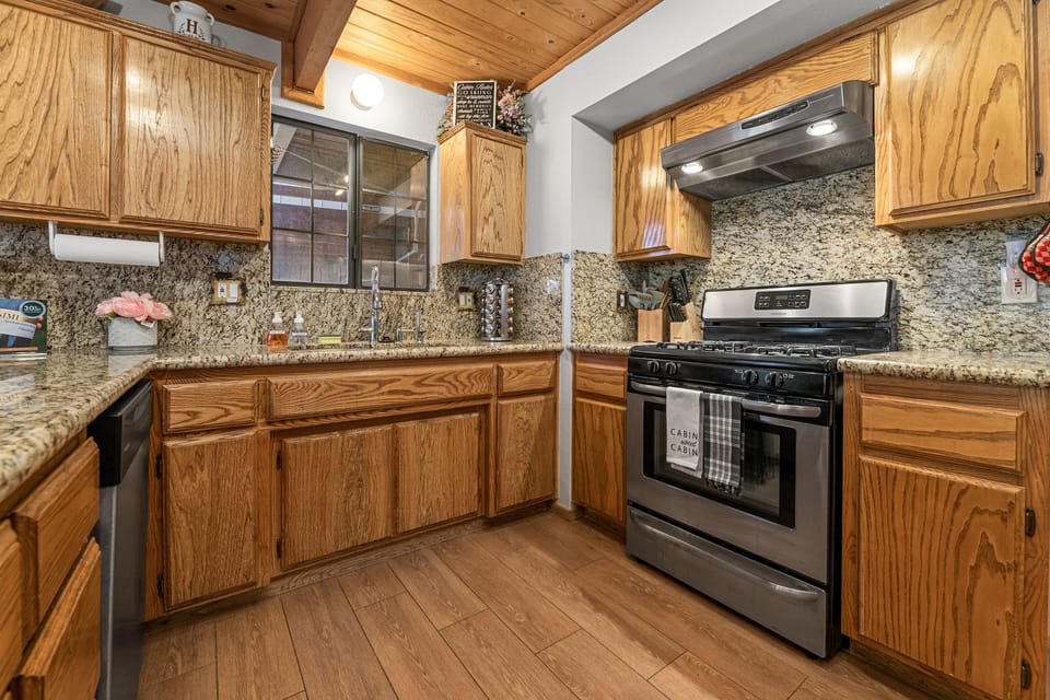 Remodeled Kitchen with granite countertops, stove, oven, dish washer, H20 filter