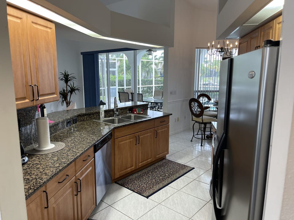 open kitchen to Family room and view to the outside