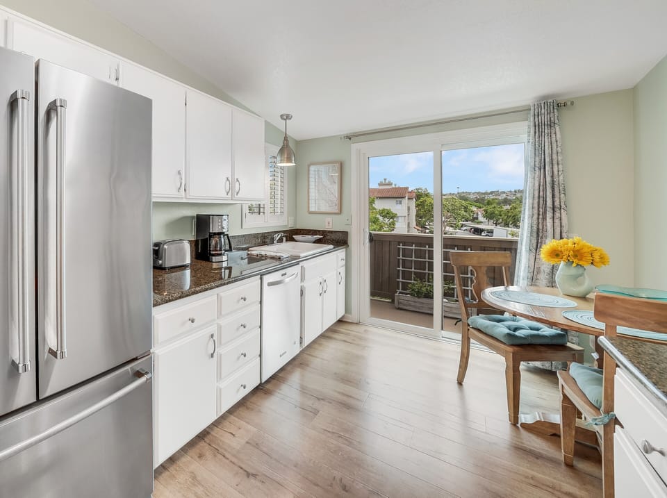BACK PATIO EXTENDS TO KITCHEN AND MASTER BEDROOM
