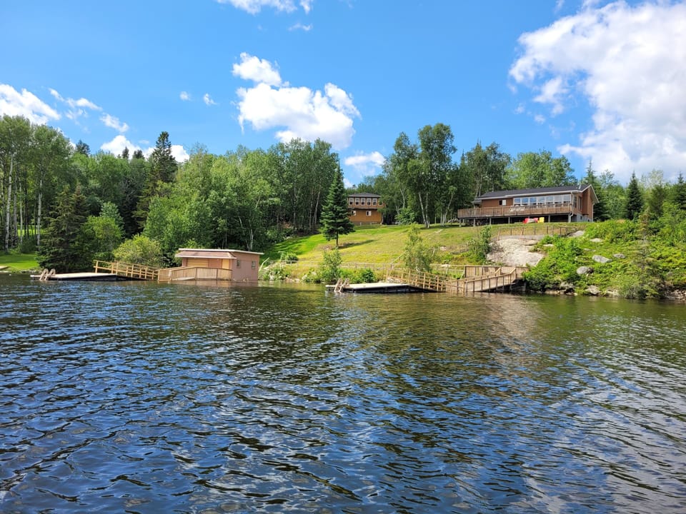 Upper suite is in top left building.  Boathouse bottom left.
High water 2022