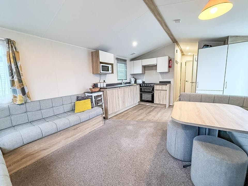 The living room in the holiday home is a peaceful retreat for evenings spent with loved ones.