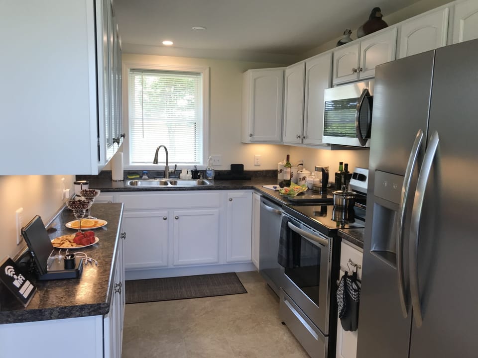 Kitchen fully stocked with basic supplies 
