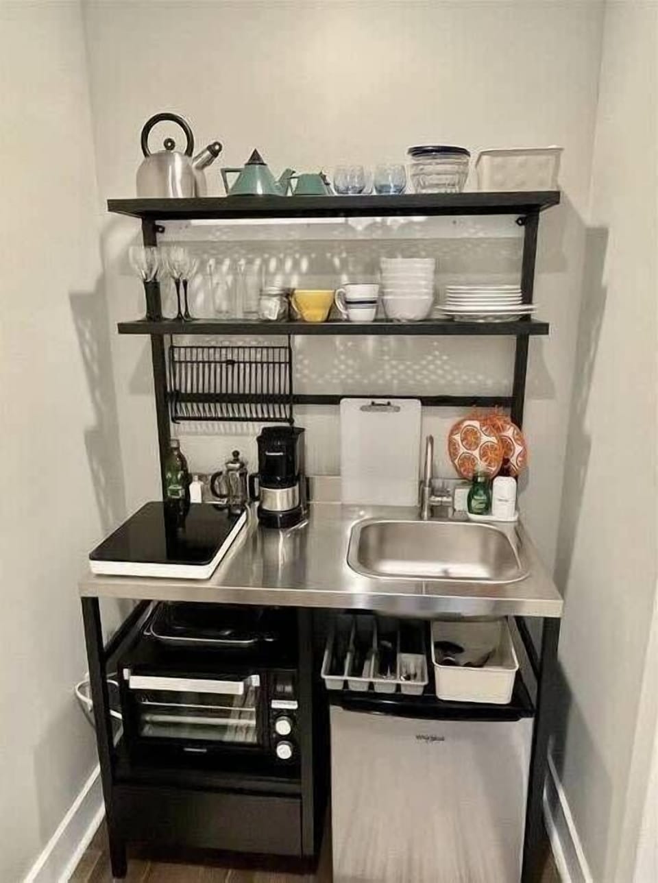Essentials included - plug in burner stovetop & convection oven & mini fridge. 