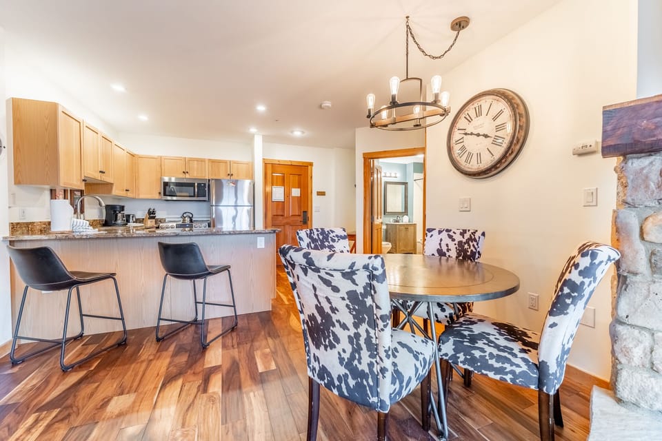 You'll love gathering around the stylish dining table while meals simmer in your fully-equipped kitchen, complete with breakfast bar seating.